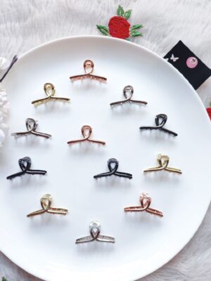 photo_6073452832129927430_y Metal Clutch