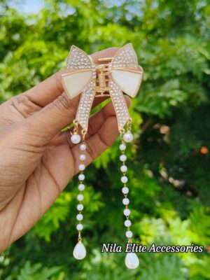 photo_6239812407451043493_y Trendy Bow Tassel Crystal Claw